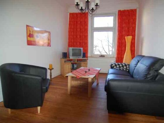 cozy living room with additional sleeping