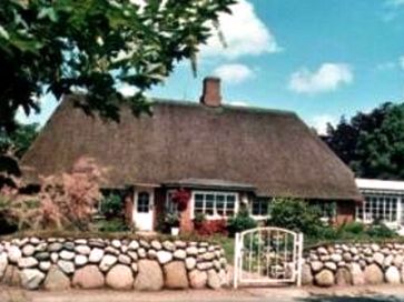 Ferienwohnung im reetgedeckten Friesenhaus Ferienwohnung im reetgedeckten Friesenhaus