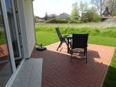 Terrasse mit Gartenstühlen