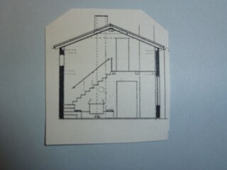 Treppe zur Empore und Schlafzimmer