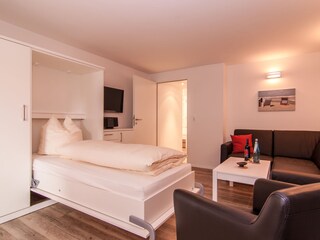 Wohnzimmer mit Extra-Bett
