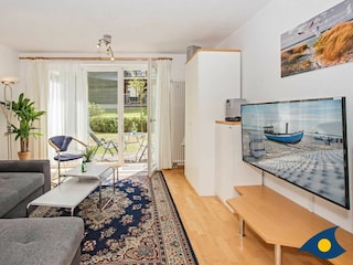 Wohnzimmer mit Zugang Terrasse