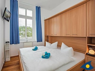 Schlafzimmer mit Doppelbett