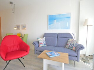 Sofa mit Nackenstützen , drehbarer Ledersessel