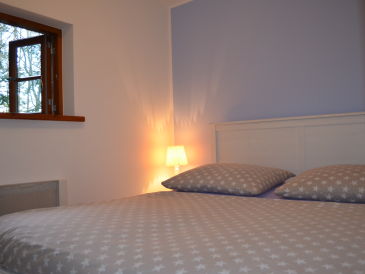 Holiday house Romantisches Holzhaus mit Ruderboot