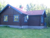 Idyllisches Ferienhaus mit Seeblick