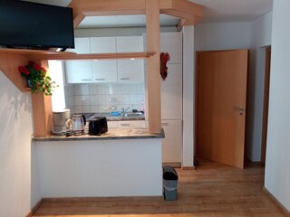 Wohnzimmer mit Küche