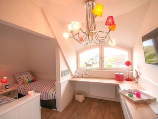 Schlafzimmer mit zwei Einzelbetten
