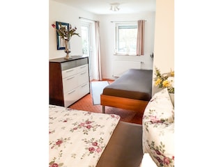 Schlafzimmer mit Terrasse