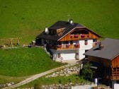 Unser Haus mit Liegewiese und Spielplatz