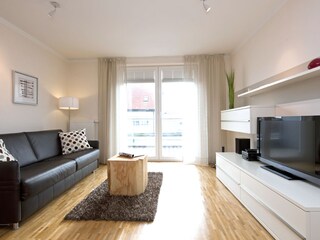 Das Wohnzimmer mit Flatscreen