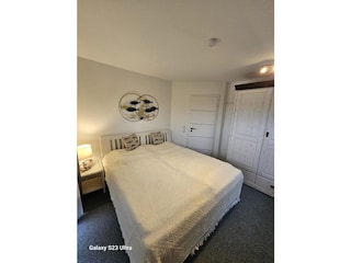 Zweites Schlafzimmer mit Doppelbett