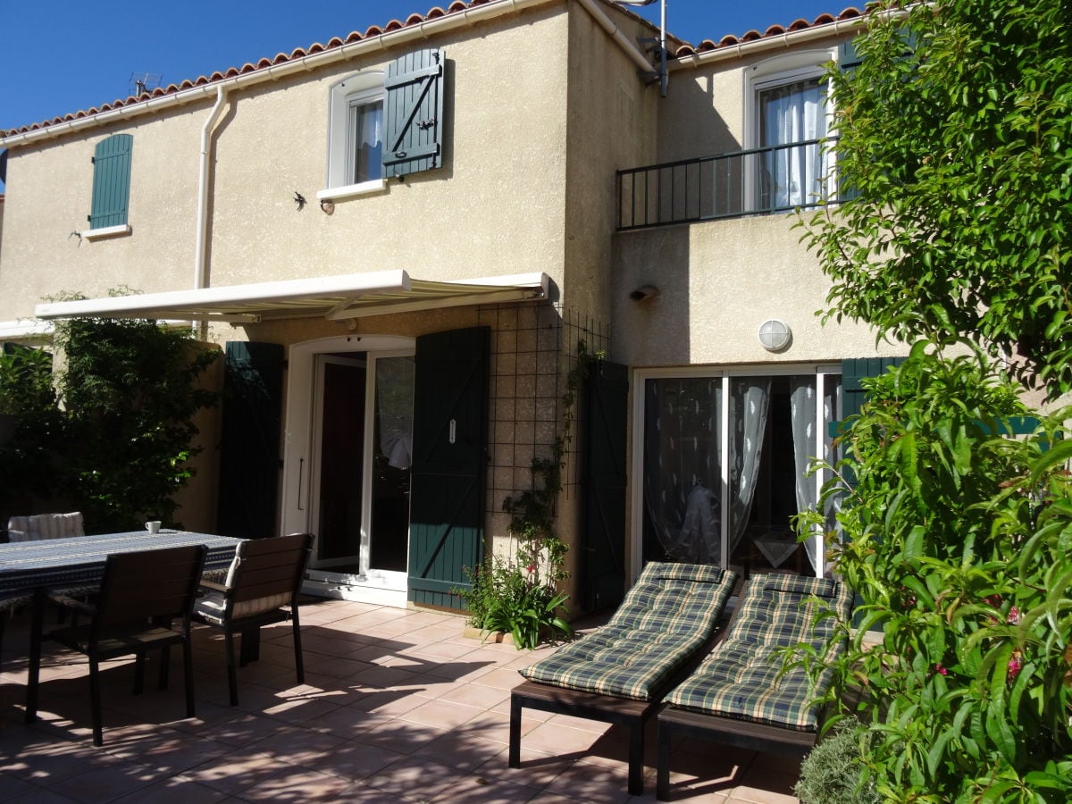 Awning and sun loungers - ideal for sunbathing.