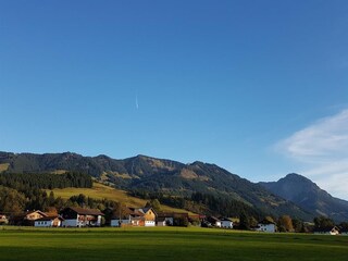 Hinang, im Hintergrund die Sonnenköpfe und Rubihorn