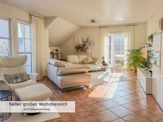 Der Blick vom Kaminofen zur Dachterrasse