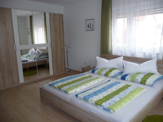 3-Bett Schlafzimmer