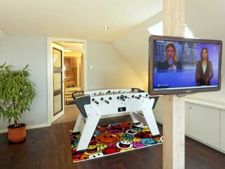 Offene Galerie mit Kickertisch, Sauna & Ruhebereich
