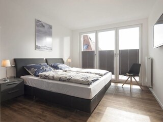 Schlafzimmer mit Doppelbett