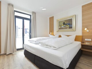 Das Schlafzimmer mit Doppelbett