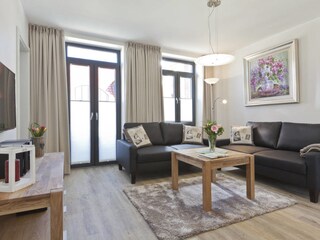 Das gemütlich eingerichtete Wohnzimmer