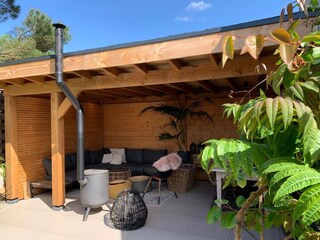 Veranda with woodoven.
