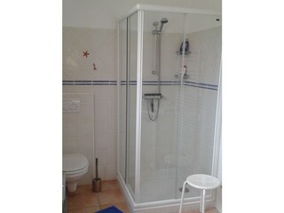 Bathroom on the upper floor with shower, toilet + sink