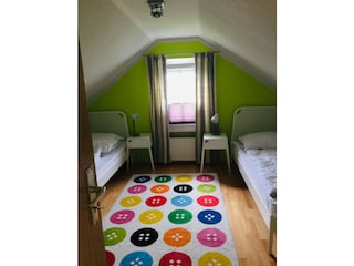 Schlafzimmer oben,Holzfußboden