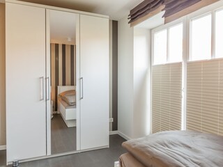 Schlafzimmer EG mit Zugang zur Terrasse