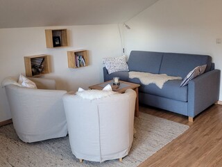 Wohnzimmer mit gemütlicher Sitzecke