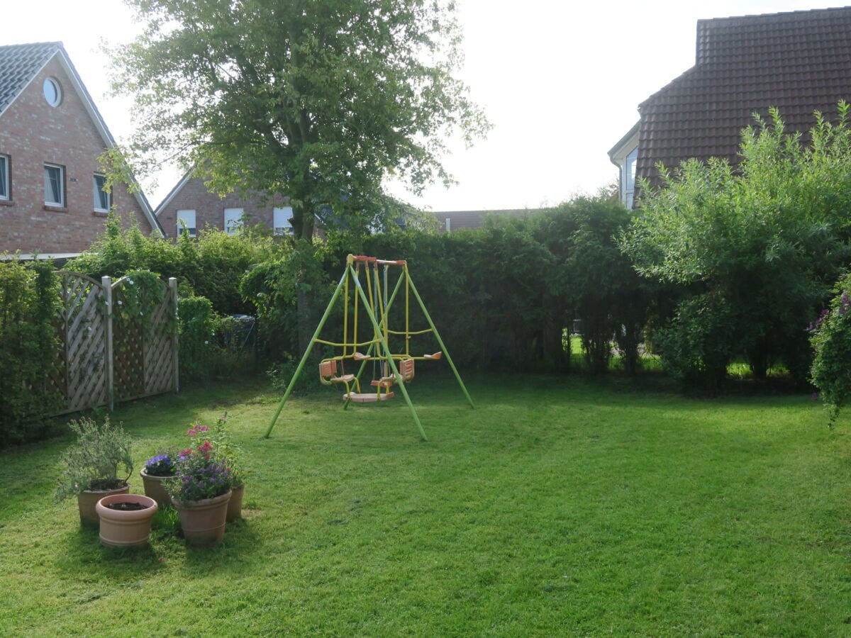 Ferienhaus -Garten mit Kinderschaukel