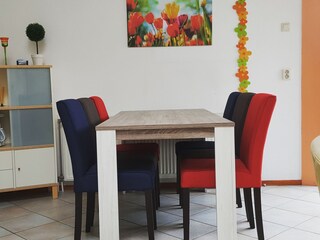 dining place with six upholstered chairs