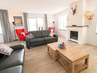 Das Wohnzimmer mit Kamin