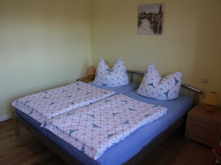 Schlafzimmer mit Doppelbett