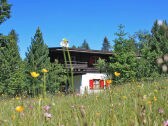 Chalet Zeller in the rose garden area