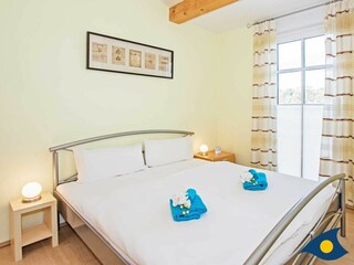 Schlafzimmer mit Doppelbett