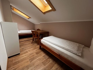 Das kleine Zimmer mit 2 Einzelbetten