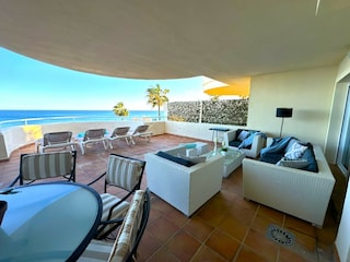 spacious covered terrace with frontal seaviews