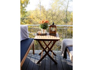 Loggia mit gemütlichen Sitzplätzen
