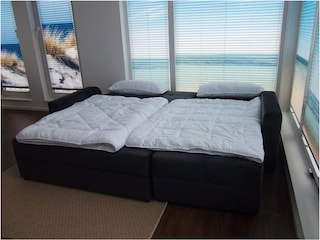 Wohnzimmer mit Schlafcouch