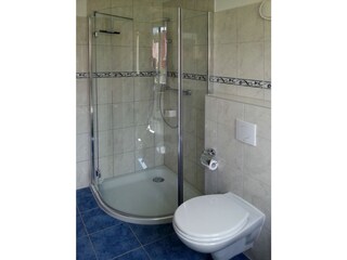 The bathroom with circular shower