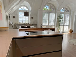 View from the kitchen onto the lake and dining area