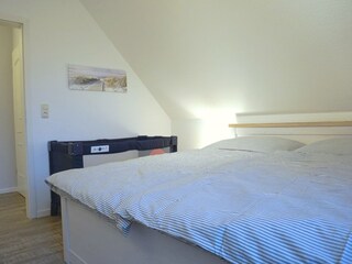 Schlafzimmer mit Doppelbett