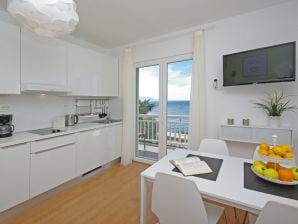Ferienwohnung Strandhaus IVA App.1