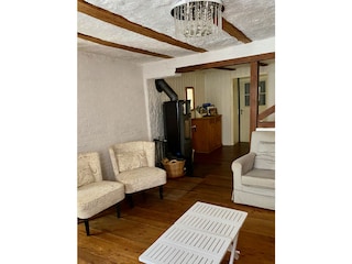 Wohnzimmer mit Holzofen