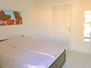 Bedroom 2 with double bed, private terrace & bathroom