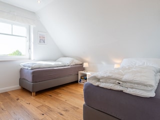 Zimmer mit zwei Einzelbetten