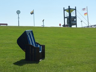 Typical roofed wicker beach chair Friedrichskoog-Spitze