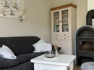 Holiday Home Nordseejuwel living room with fireplace