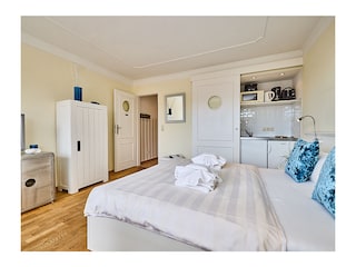 Schlafbereich mit Kochnische