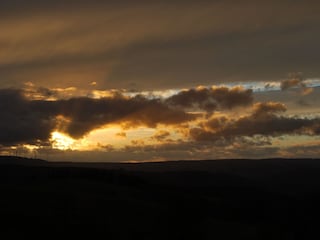 Ausblick - Sonnenuntergang aus der Gaube